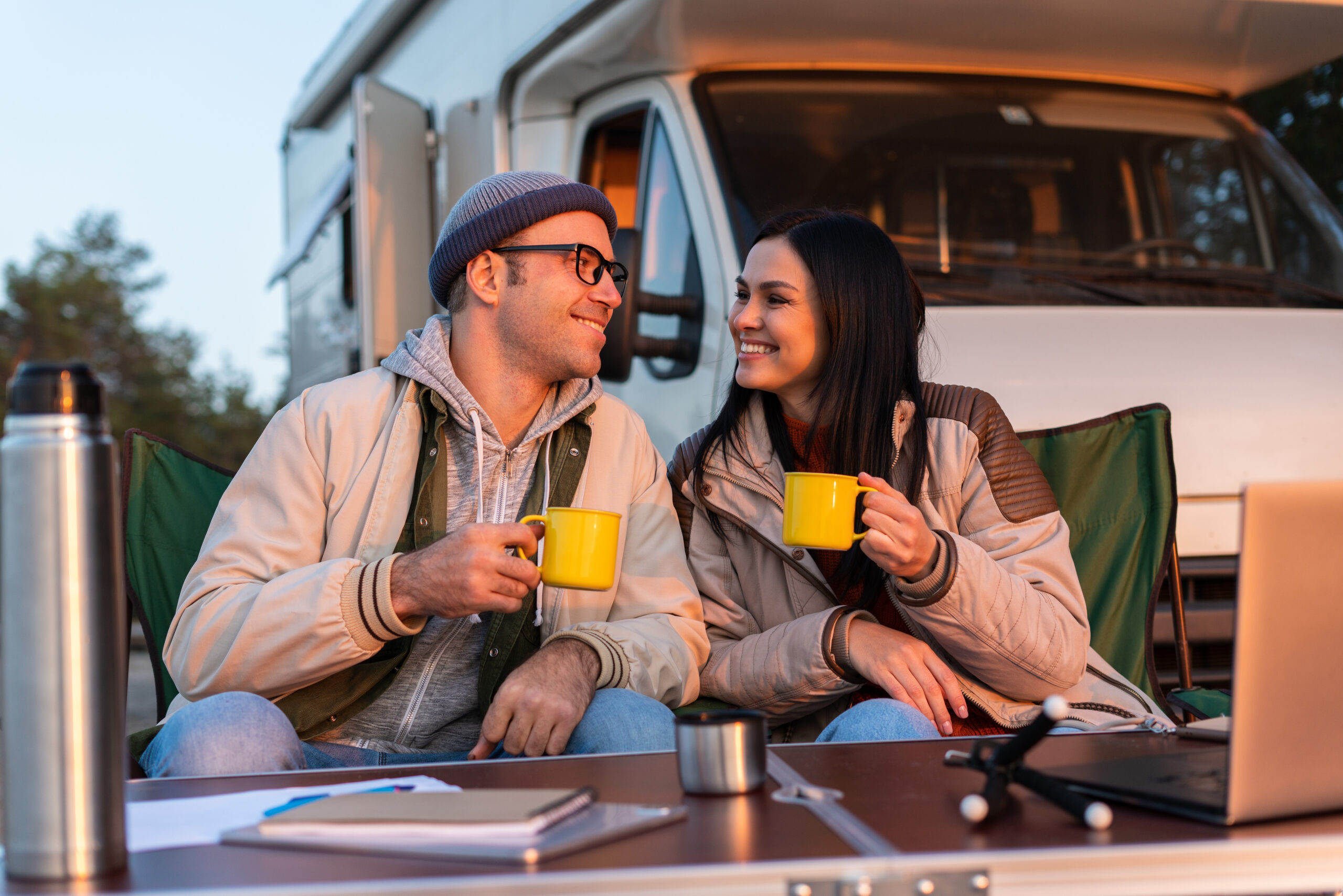 Happy couple camping no foot pain podiatrist